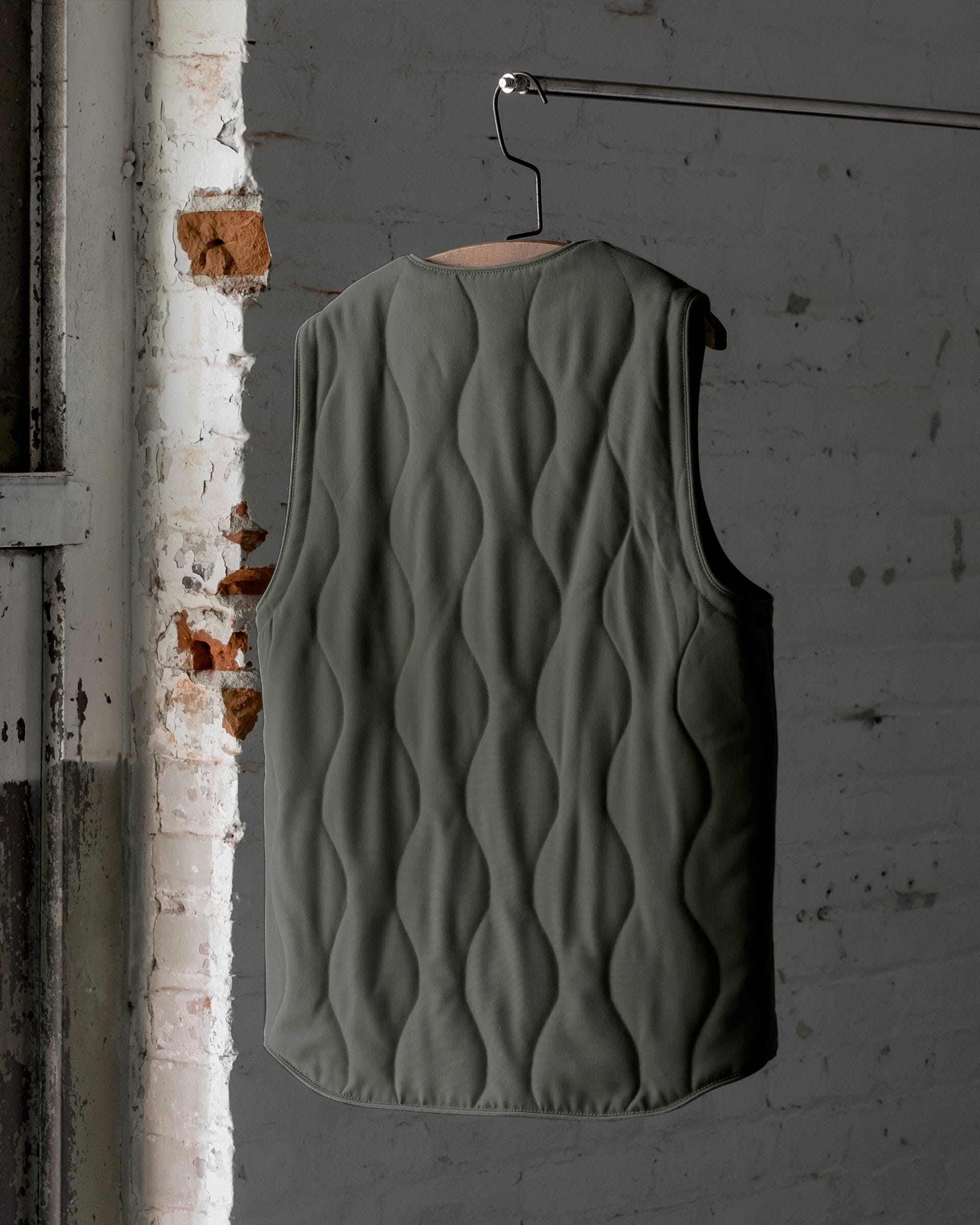 The Mens Quilted Wool Vest in Moss Green - Back #color_moss green