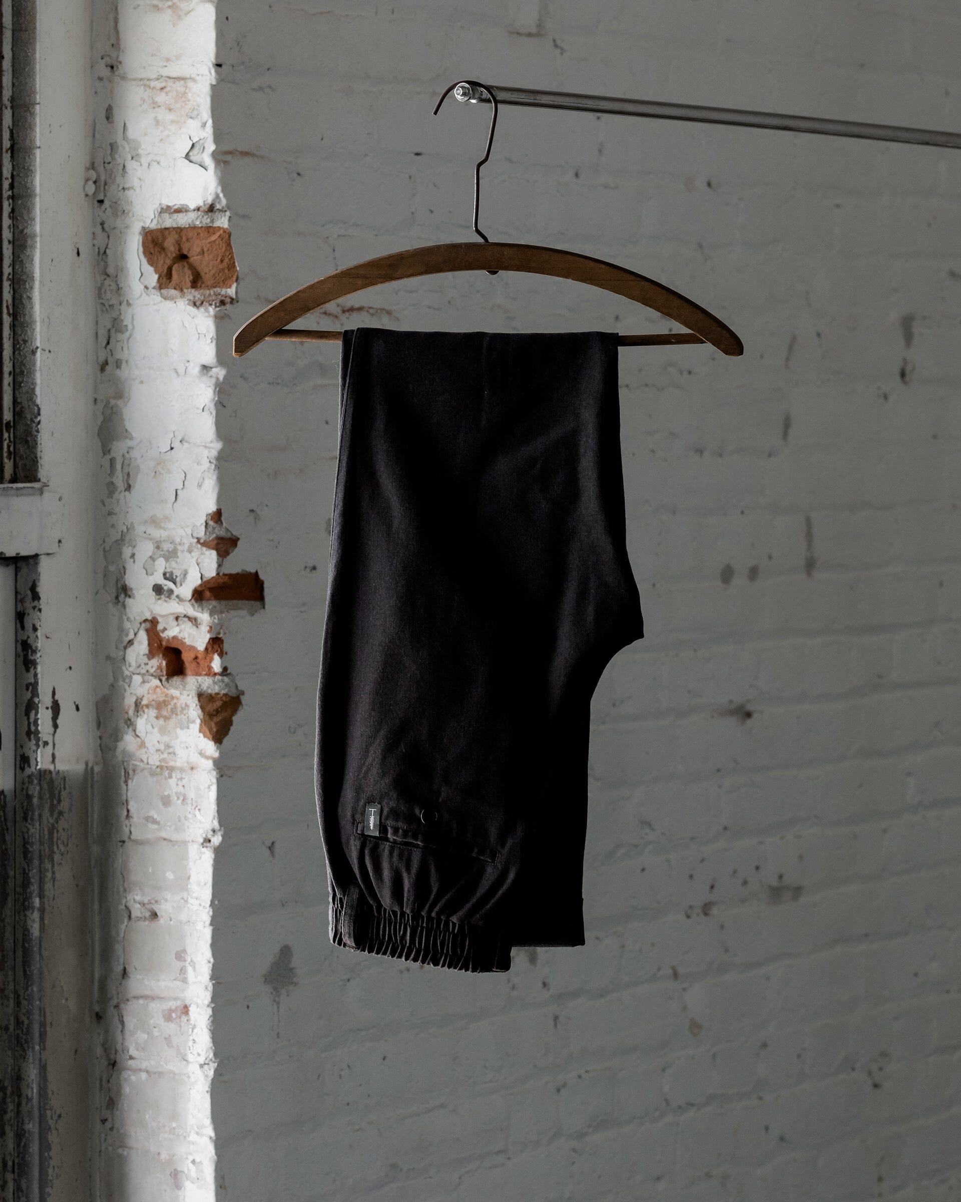 The Mens Light Wool Pants in Heather Dark Brown - Folded #color_heather dark brown