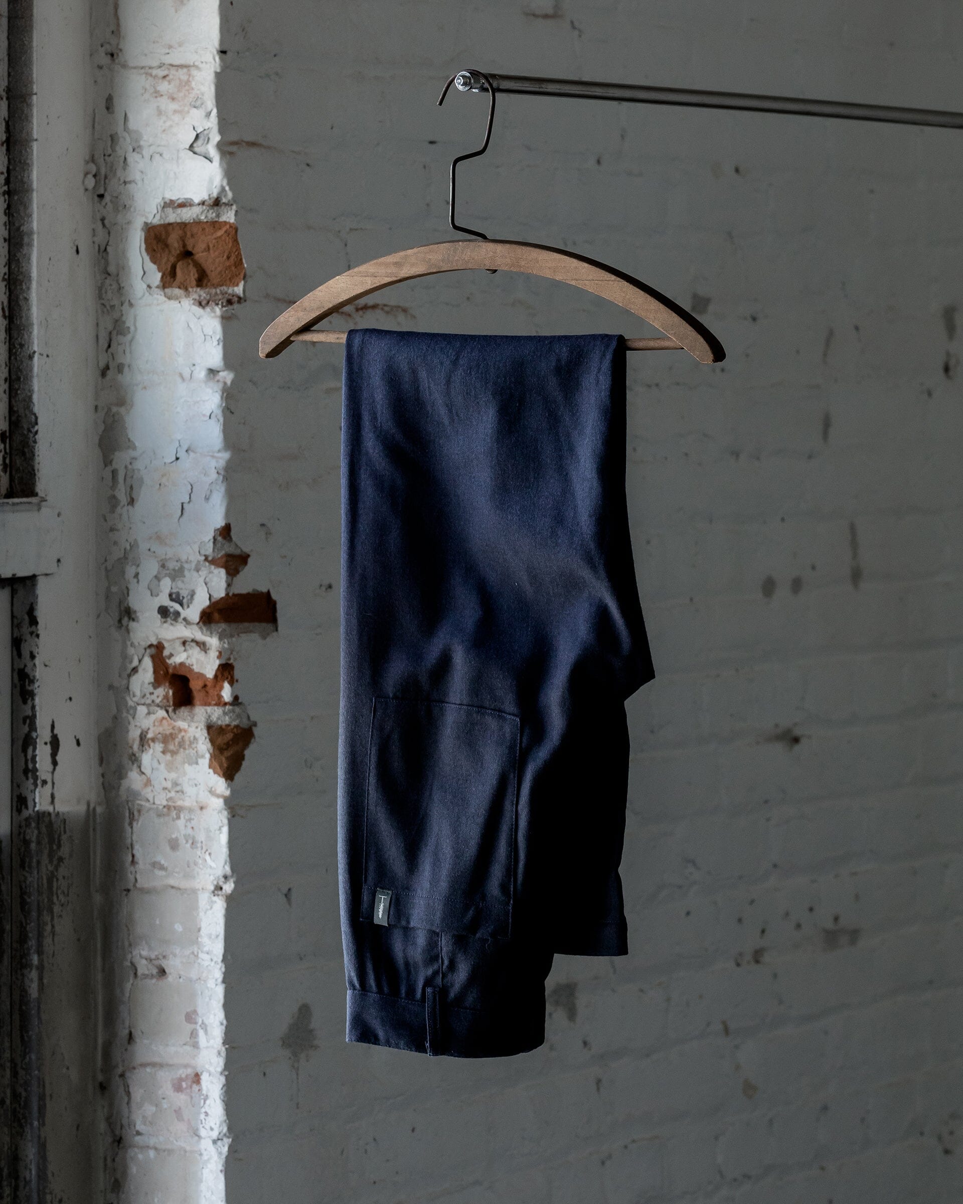  #color_heather navy The Womens Light Wool Pant in Heather Navy Folded