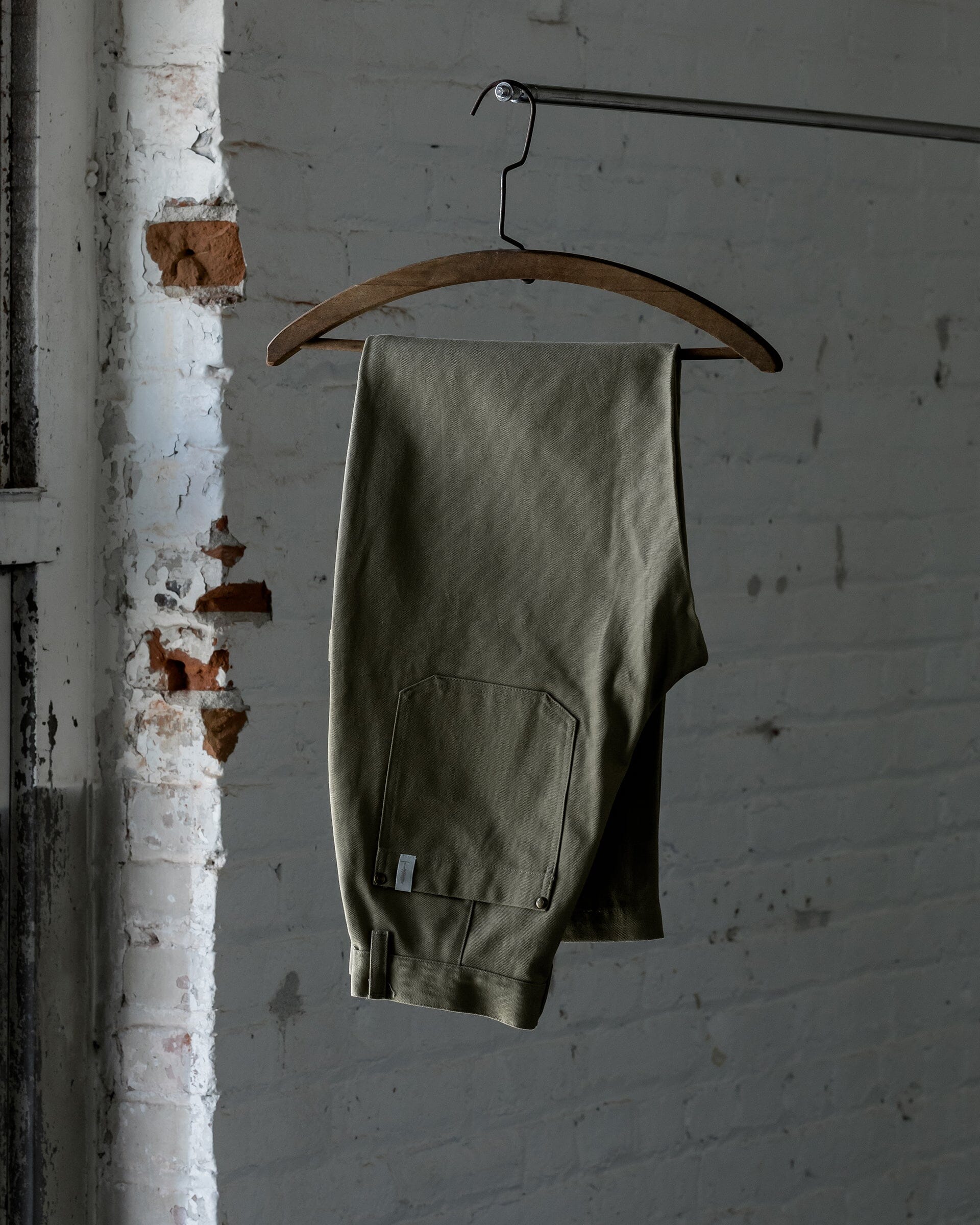 The Womens Canvas Work Pant in Coriander - Folded #color_coriander