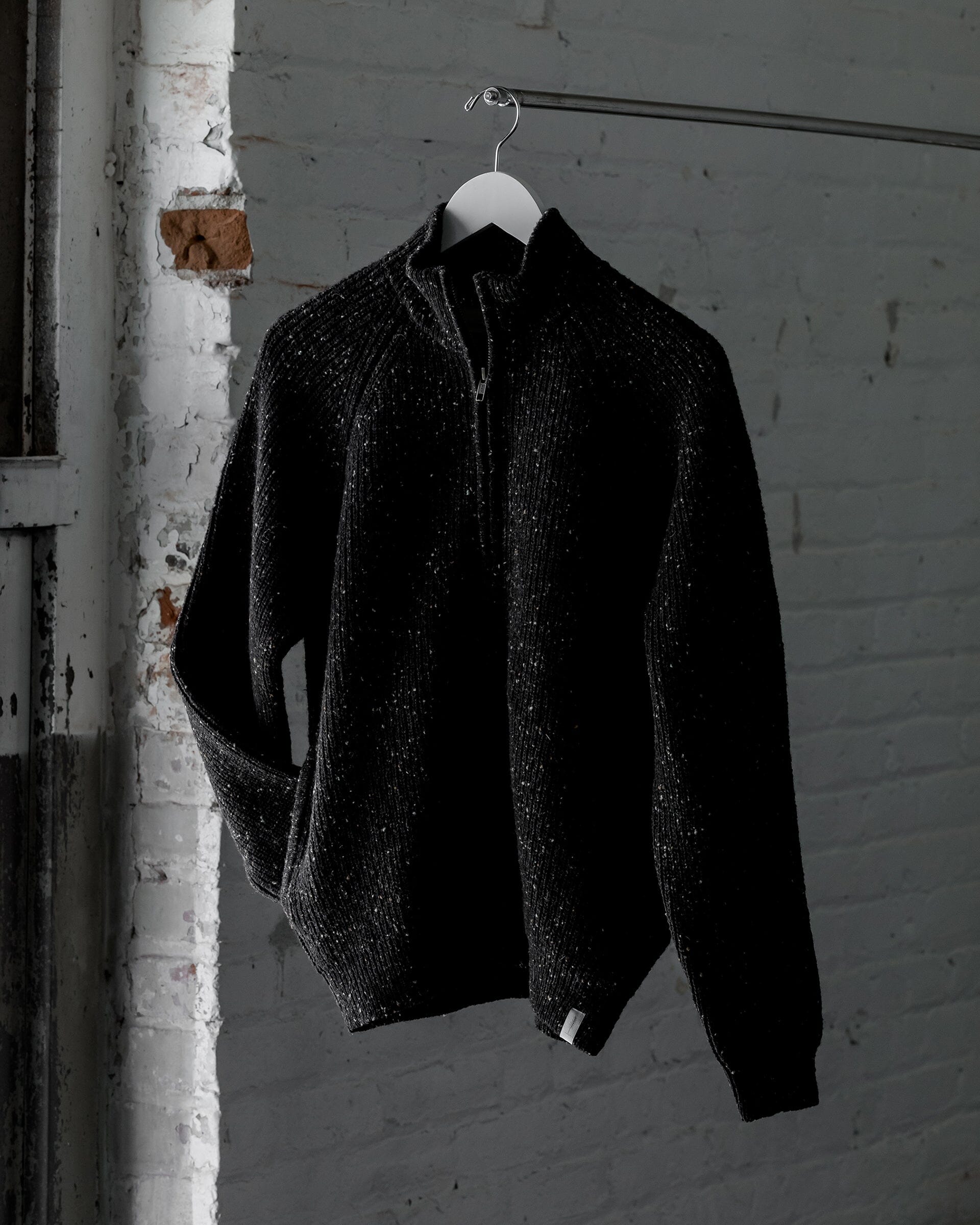 The Mens Fisherman Sweater in Speckled Black - Front #color_speckled black