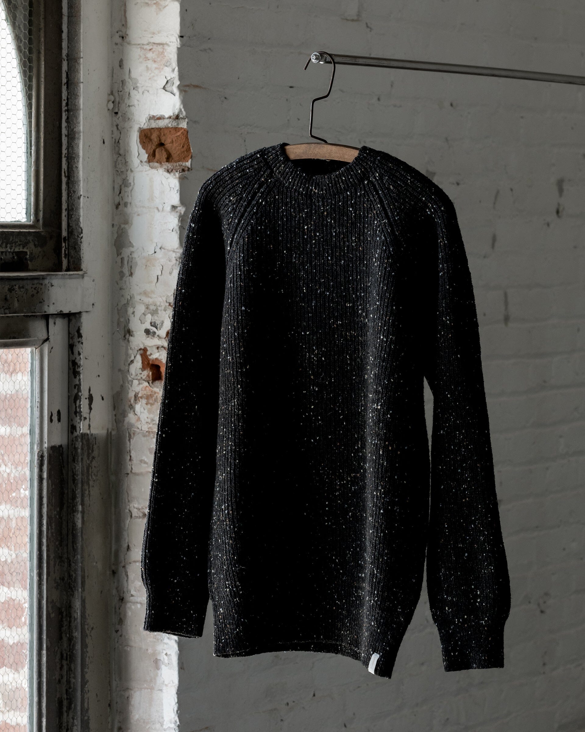 The Men's Fisherman Sweater in Speckled Black - Front #color_speckled black