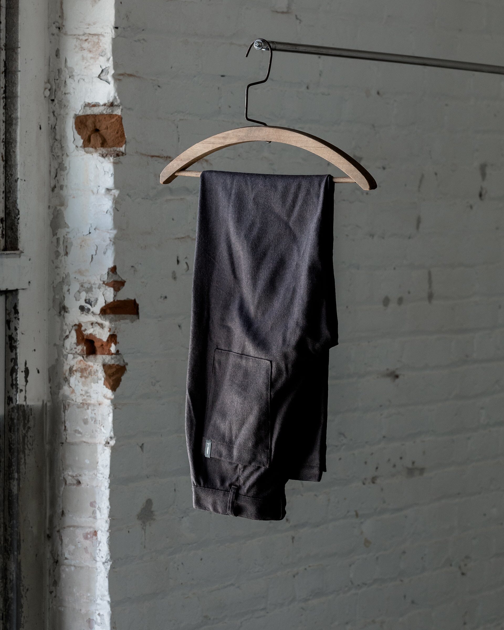 The Womens Light Wool Pant in Heather Dark Brown - Folded #color_heather-dark-brown