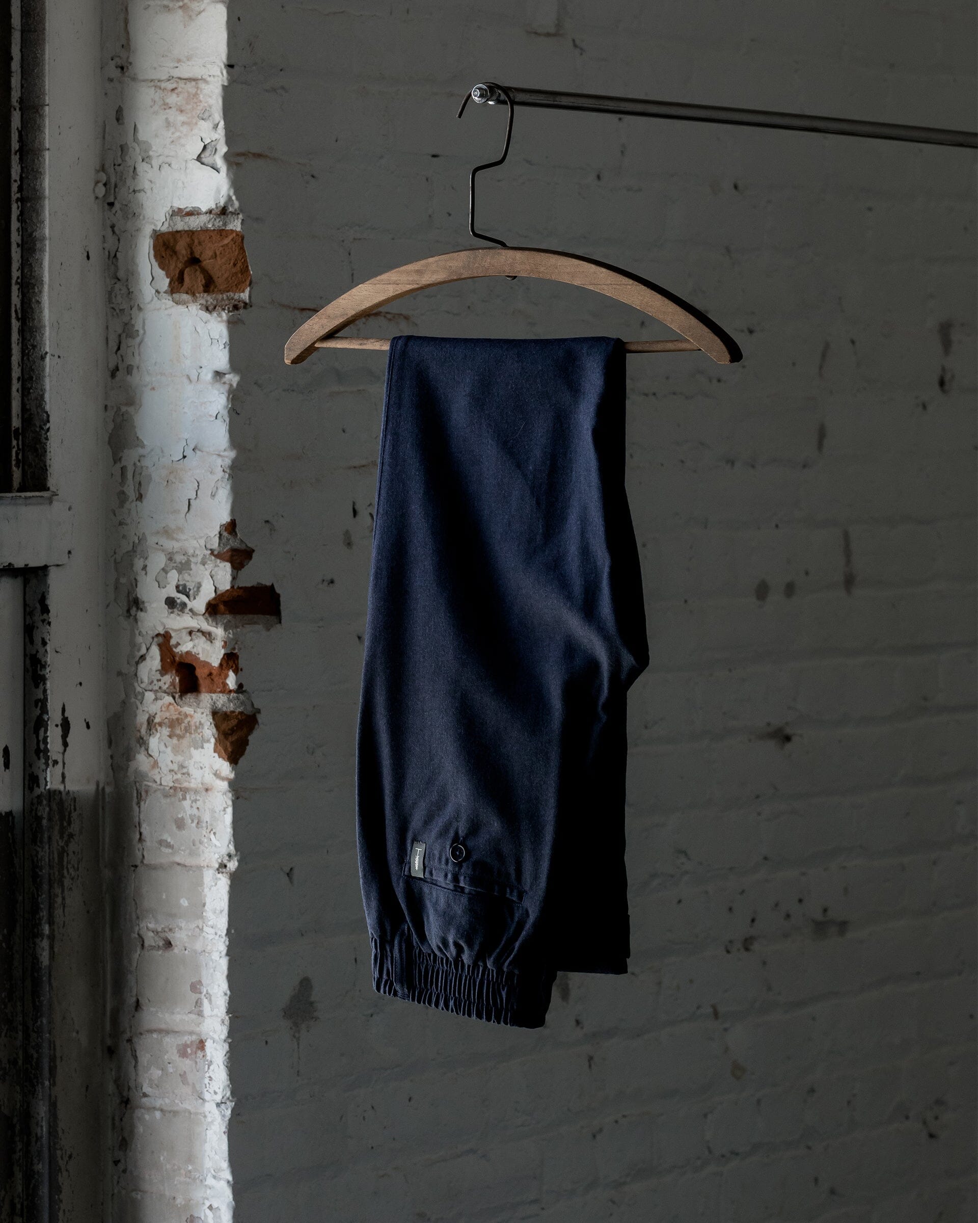 The Mens Light Wool Pants in Heather Navy - Folded #color_heather navy