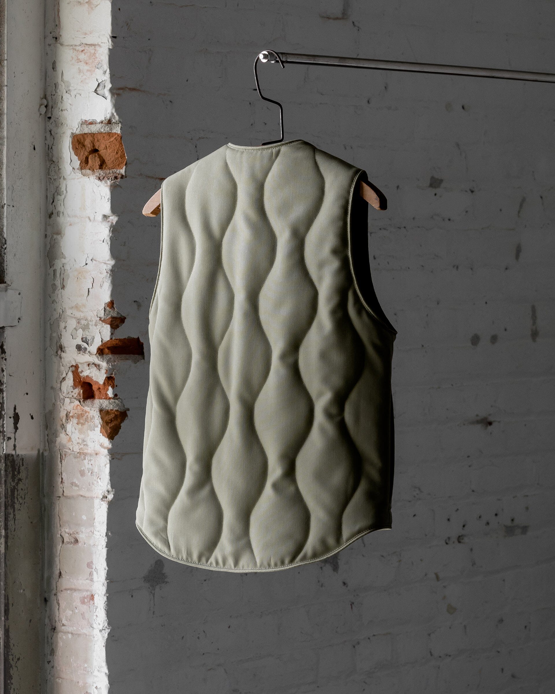 The Womens Quilted Wool Vest in Lichen - Back #color_lichen