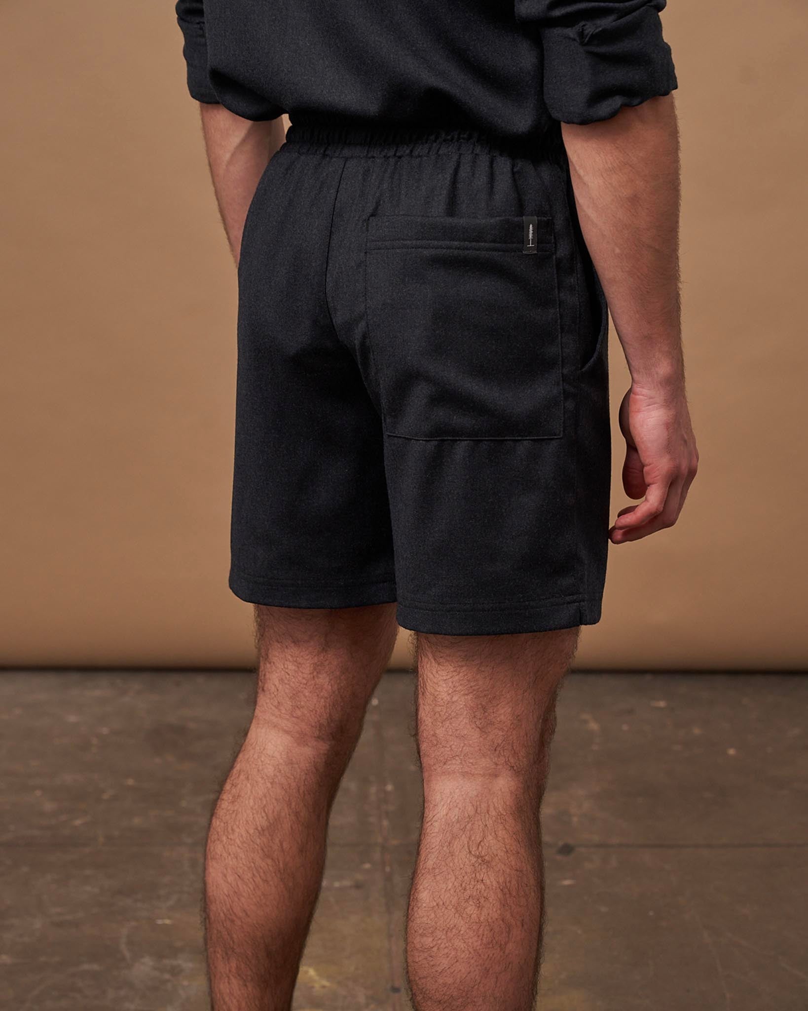 The Mens Light Wool Short in Heather Charcoal Back #color_heather-charcoal